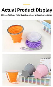 Multi-color silicone collapsible cups in various stages of folding with lanyards