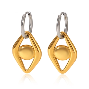 Close-up of dual-tone geometric hollow earrings with silver hoops and gold diamond pendants
