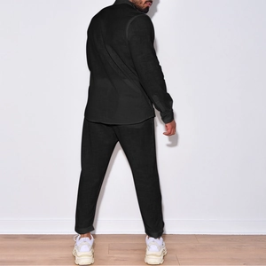 Rear view of men's linen casual set showing slim fit long-sleeve shirt and black trousers