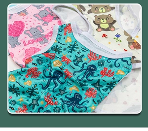 Detailed view of breathable cotton pet vests with colorful cartoon animal prints
