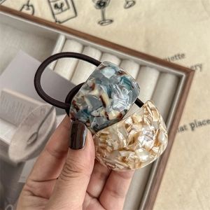 Elegant semi-circular acetate hair ties with vintage marble patterns and elastic bands