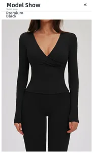 Deep V-neck wrap-style long sleeve yoga top in premium black with elastic slim fit design