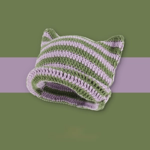 Detail of crochet striped beanie with cat ear design in green and purple colors