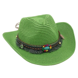 Detailed macro of grass green cowboy hat with ethnic beads, turquoise and gray tassels