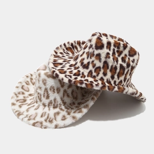 Detailed view of plush leopard print cowboy hats in thick faux fur for winter warmth