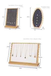 Bamboo necklace display stands in multiple sizes with velvet slots for jewelry storage
