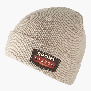 Beige ribbed knit beanie with sport fashion leather patch and metal rivets