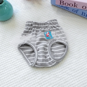 Detail of gray striped dog physiological pants with lace mesh trim and cute patch