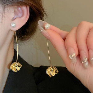 French minimalist gold flower pearl drop earrings for women with elegant metal leaf design