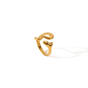 Detail of 18K gold-plated stainless steel ring featuring organic wave curves and adjustable design