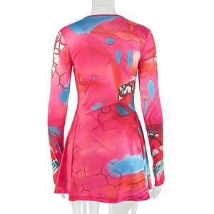 Back view of long sleeve mini dress with abstract pink and blue graffiti print detail