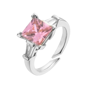 Detail of adjustable silver ring featuring square pink zircon and trapezoid side stones
