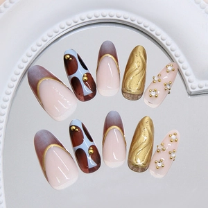 French luxury handmade press-on nails set with gold leaf and leopard pattern designs