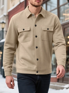 Detailed view of men's casual beige waffle textured jacket with double chest pockets