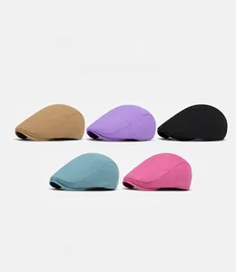 Detail view of cotton-linen beret caps in khaki, purple, black, light blue, and rose pink