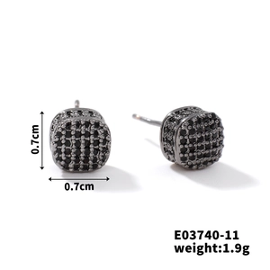 Macro detail of gunmetal zircon stud earring measuring 0.7cm by 0.7cm and 1.9g