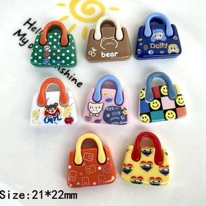 Close-up of colorful resin handbag charms 21x22mm for DIY phone case and crafts
