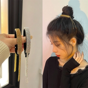 Sparkling rhinestone tassel hair clip for bun hairstyles with model wearing view