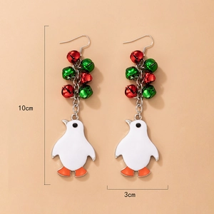 Detailed view of penguin Christmas earrings with red and green bells and 10cm length scale