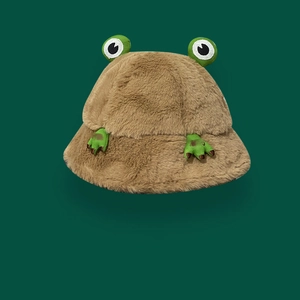 Detailed view of the soft plush texture and cute frog eyes on a brown bucket hat