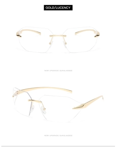 Close-up of frameless geometric sunglasses with gold metal temples and clear lenses