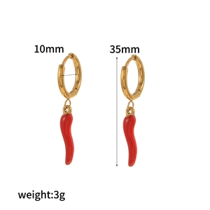 Detail view of red pepper earrings in gold showing 35mm length and 3g weight specifications