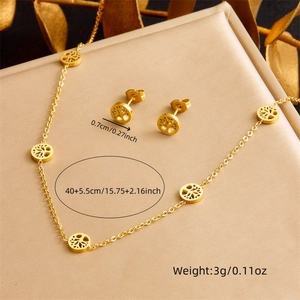 Golden Tree of Life jewelry set featuring hollow round pendant necklace and stud earrings