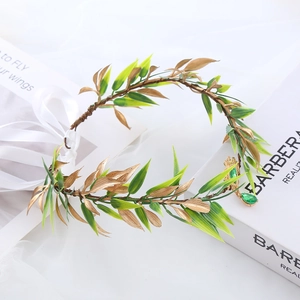 Baroque forest style headband featuring gold leaves and a green teardrop forehead pendant