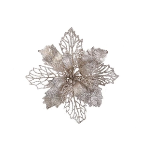 Macro detail of silver glitter artificial Christmas flower with hollowed-out mesh petals