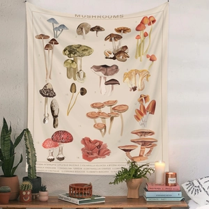 Bohemian mushroom botanical tapestry hanging on wall with decorative indoor plants