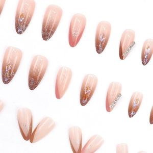 Pink and brown gradient almond press-on nails with silver glitter and rhinestone accents