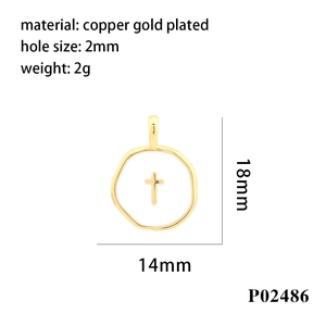 Macro detail of a 14x18mm copper gold-plated cross pendant with dimensions and weight