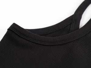 Close-up of the V-neck and ribbed knit texture on a black athletic sports tank top