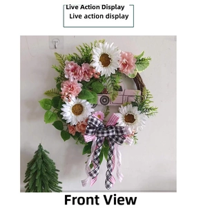 Detail of pink vintage truck plaque on floral wreath with sunflower and rose