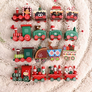 Classic wooden Christmas train set with four colorful carriages for holiday decoration