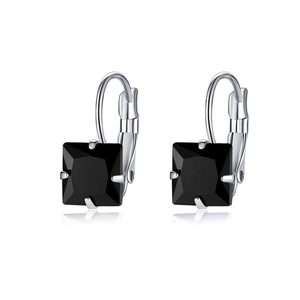 Detailed macro view of square-cut black gemstone earrings with silver leverback closures