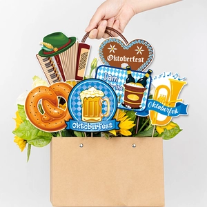 Oktoberfest party decoration kit with paper props and flowers in a kraft bag on white back