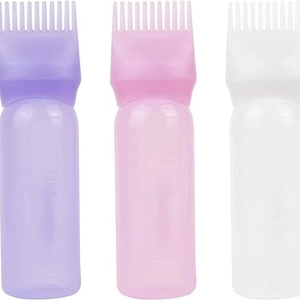 Set of 3 colored hair dye applicator bottles with comb brush tips in purple pink white