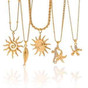 Elegant gold plated stainless steel necklaces featuring sun, fish, seahorse and dog pendants