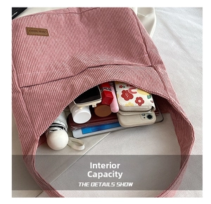 Pink corduroy tote bag showing large capacity with tablet, umbrella and makeup inside