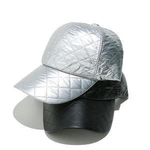 Silver and black quilted faux leather baseball caps with glossy finish in a stacked view