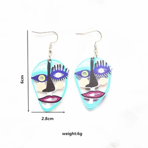 Abstract face acrylic earring with dimensions 6cm by 2.8cm and 6g weight on white background