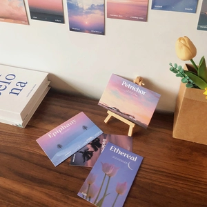 Macro shot of Nordic style aesthetic wall art cards with English word definitions on wood