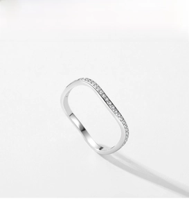 Detailed view of S925 sterling silver rectangular ring with micro-pave wave diamonds