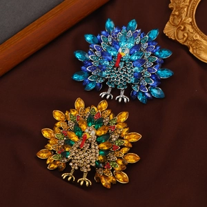 Vintage turkey brooch with colorful rhinestones in blue and orange gold settings