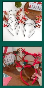 Detailed close-up of plush reindeer antler headband with festive bells and pine cones