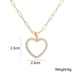 Detailed view of 2.3cm gold heart pendant showing dimensions and 6g weight specifications