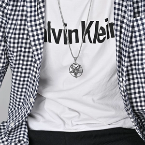 Retro stainless steel Baphomet goat pentagram pendant necklace shown on a male model