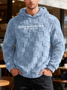 Detail of Los Angeles lettering and grid texture on men's blue fleece hoodie