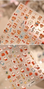 Detail of 3D embossed rabbit and bear nail stickers with Chinese New Year motifs